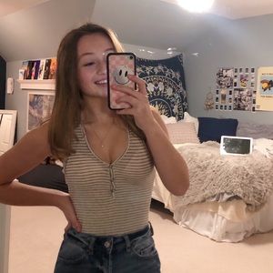 NEVER WORN black and white bodysuit in a size xs!